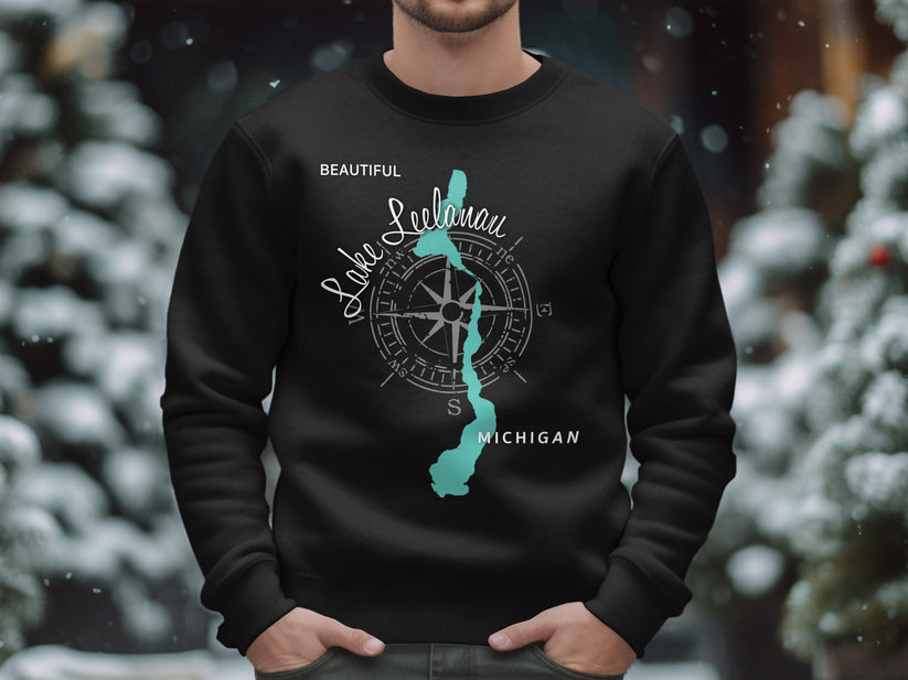 Black sweatshirt with "Beautiful Leelanau Lake Michigan" text and compass design.