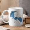 White mug with Forest Lake, Minnesota map and compass design.