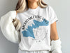 White t-shirt with blue Merrymeeting Lake map graphic and compass rose.