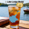Glass of iced tea with a lemon slice, featuring a map design and "Lake Lodge Media" text.