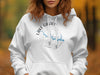 White hoodie with "Lake Gaston Virginia" and compass graphic.