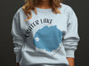 Crater Lake Oregon graphic sweatshirt with compass rose design.