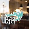 Spivey Life graphic sticker with turquoise lake shape on glass.