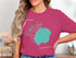 Pink t-shirt with a turquoise map of Buffalo Lake and compass design.