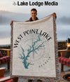 Woven blanket with West Point Lake, Georgia map and compass design.