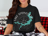 Black t-shirt with Lake Springfield, Missouri map and compass graphic.