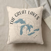 Cream pillow with blue Great Lakes map, compass rose, and text "THE GREAT LAKES USA".
