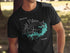 Black t-shirt with a compass graphic and map outline of Wright Patman Lake, Texas.