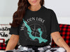 Black t-shirt with graphic of Walloon Lake and compass rose, reads "Walloon Lake Michigan".