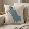 Pillow with blue map outline of Cain Lake, Washington and circular text.