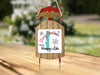 Sled ornament with "Merry Christmas FROM Honeoye Lake" text and state outline.