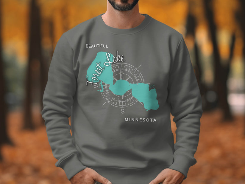 Gray sweatshirt with "Beautiful Forest Lake Minnesota" text and compass graphic.