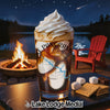 Glass with whipped cream and caramel, camp scene with fire pit, lake, and chair.