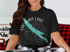Black t-shirt with turquoise outline of Lakeamas and compass design, Washington.