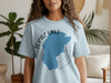Light blue t-shirt with a graphic of Topaz Lake and the words "Topaz Lake" and "California".