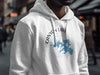 White hoodie with Canyon Lake, Texas graphic on the chest.
