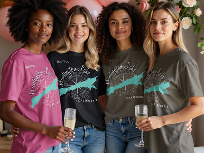 Four women wearing t-shirts with "Huntington Lake CALIFORNIA" in teal and olive green.
