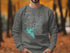 Gray sweatshirt with "New Melones Lake California" and compass graphic.