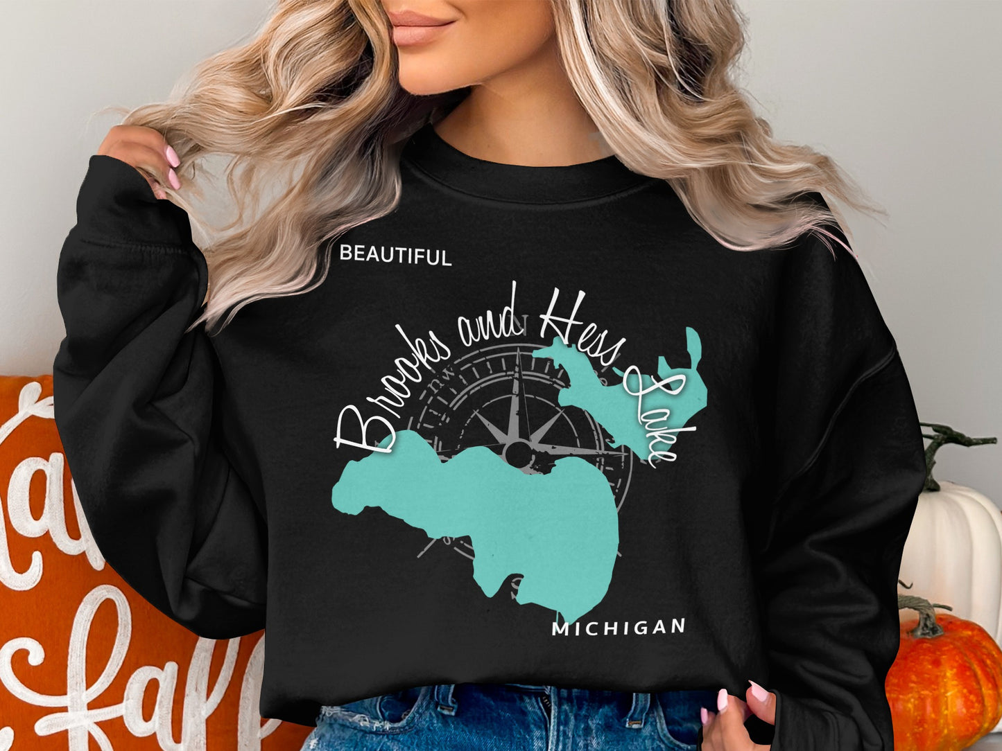 Black sweatshirt with "Brooks and Hess Lake Michigan" and a compass rose.