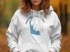 White hoodie with blue Parker Canyon Lake Arizona map and compass design.