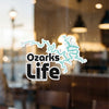 Ozarks Life sticker with aqua-blue lake shape and copyright text.
