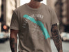 Taupe t-shirt with turquoise Eklutna Lake map graphic and compass rose and "Alaska".