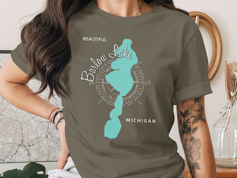 Olive green t-shirt with "Beautiful Barlow Lake Michigan" text and compass rose.