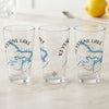 Clear glasses with Keystone Lake map and compass design.
