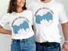 White t-shirts displaying a blue map of Diamond Valley Lake, California and a compass rose.