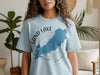Light blue t-shirt with Sand Lake Ontario map and compass graphic.