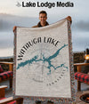 Watauga Lake map design on a fringed throw blanket with compass rose.