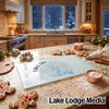 A glass cutting board featuring a Lake LBJ map design on a kitchen counter.