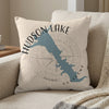 Light beige pillow with blue Hudson Lake map and compass graphic.