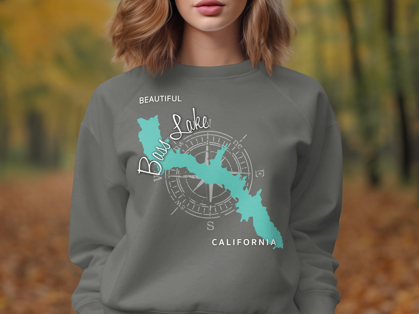 Crewneck sweatshirt with teal Bass Lake California map and compass rose design.
