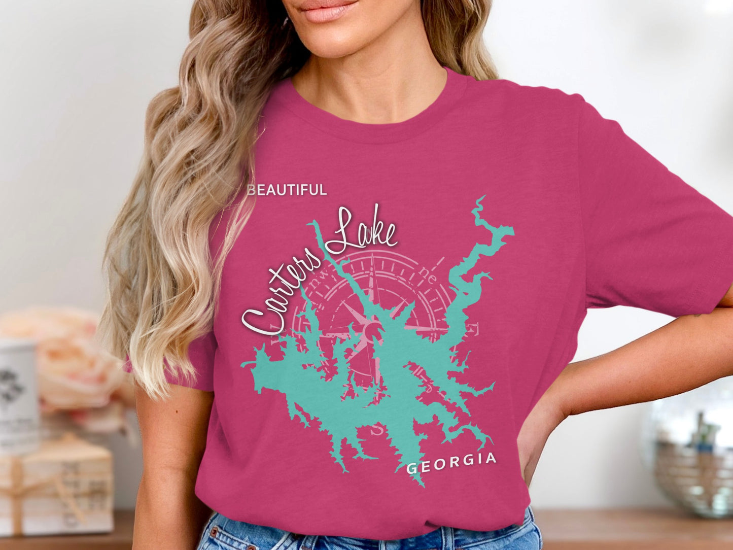 Pink t-shirt with a teal map of Carters Lake, Georgia and compass rose.