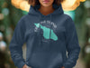 Dark blue hoodie with white text and aqua map of Catalina Island, California.