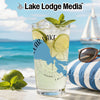 Glass of iced lemonade with lime and mint, featuring a lake map and compass design.