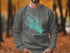 Dark gray sweatshirt with "Beautiful Lake Winnipesaukee New Hampshire" and compass graphic.