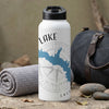 White thermos with "LAKE CALI" and blue lake design on compass background.