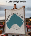 Woven blanket featuring a teal lake map with "Little Turtle Lake" and "Minnesota" text.