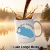 White mug with Round Valley Reservoir map and coffee splashing into it.