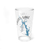 Clear glass pint glass with Falcon Lake map and compass design.