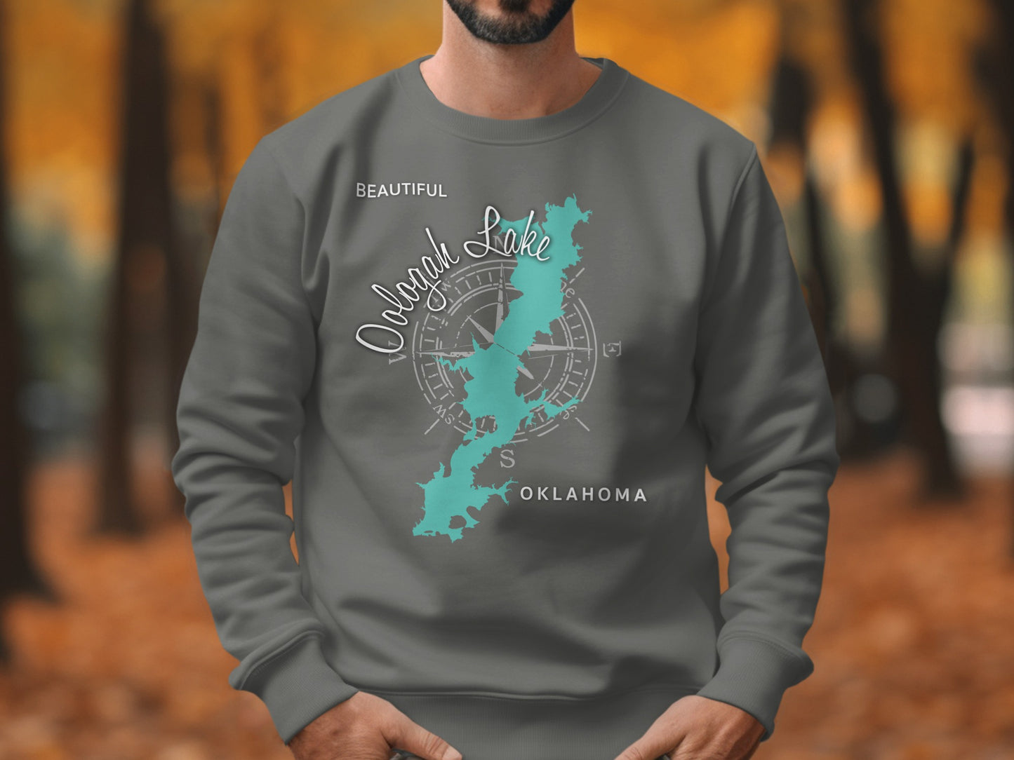 Dark gray sweatshirt with a teal map outline of Oologah Lake, Oklahoma.