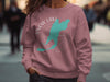 Crew neck sweatshirt with Snow Lake, Washington graphic and compass design.