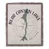 Woven blanket with Bear Canyon Lake map outline, compass, and text.