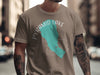 Taupe t-shirt with Pyramid Lake, Nevada graphic and compass rose.