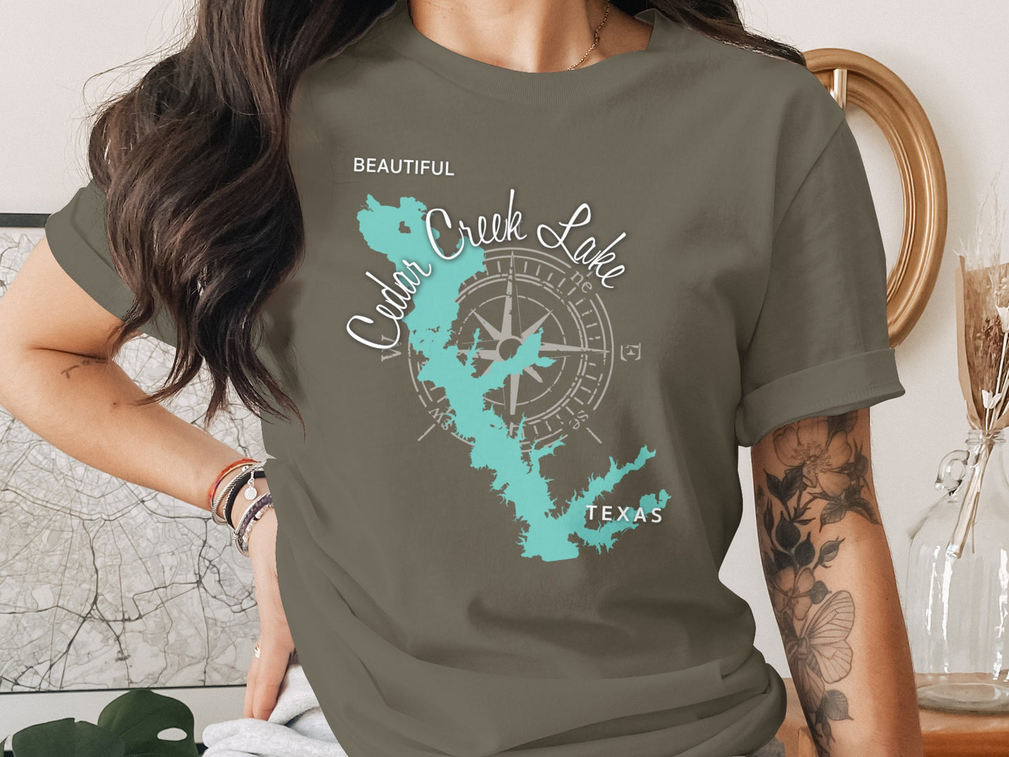 Dark grey t-shirt with turquoise Cedar Creek Lake, Texas map and compass design.