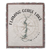 Flaming Gorge Lake Wyoming map and compass design on a fringed throw blanket.