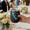 Black tumbler held by hand, featuring Cedar Creek Lake map and compass design.