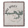 Woven blanket featuring "Lake Spivey Georgia" text, a compass, and a lake map outline.